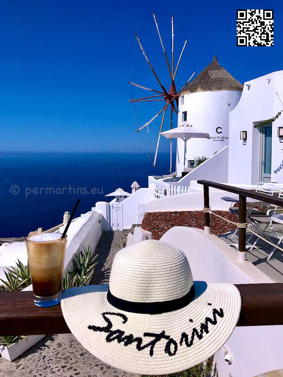 Greece Santorini Oia hat windmill coffee view blue sky