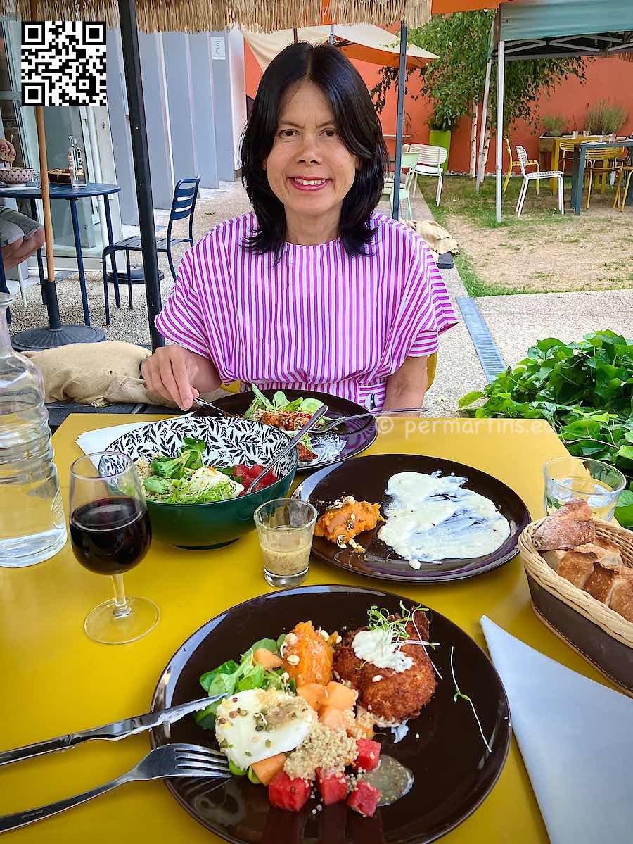 France Tours woman eating vegetarian food outdoors in Etape 84