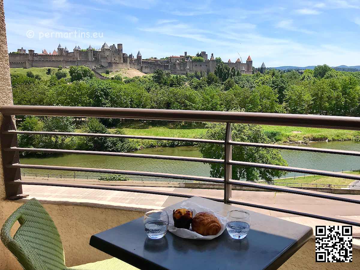France Carcassonne Hotel Tribe view from balcony towards the stunning old town Cité Médiévale and the river Aude.