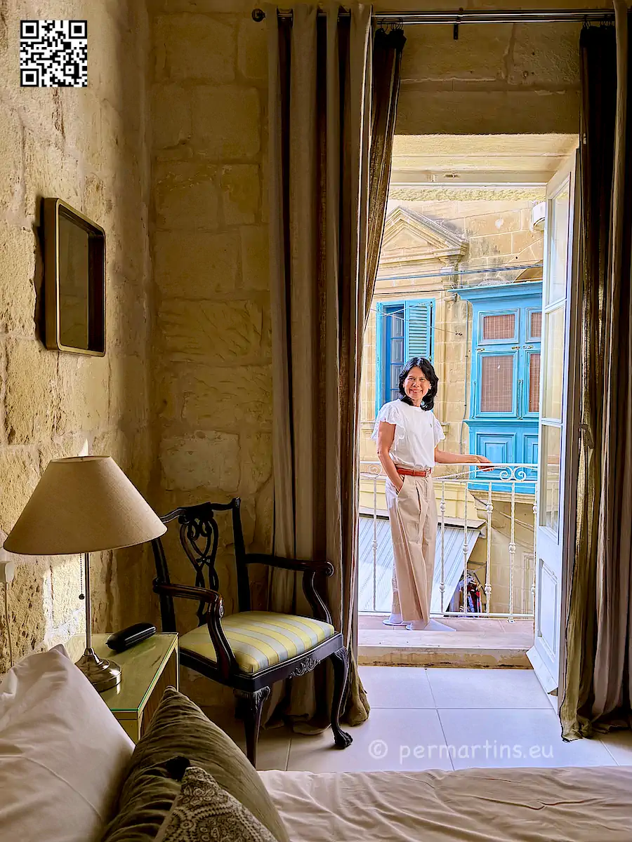Malta Gozo Victoria woman at Provicario hotel Cittadella in background