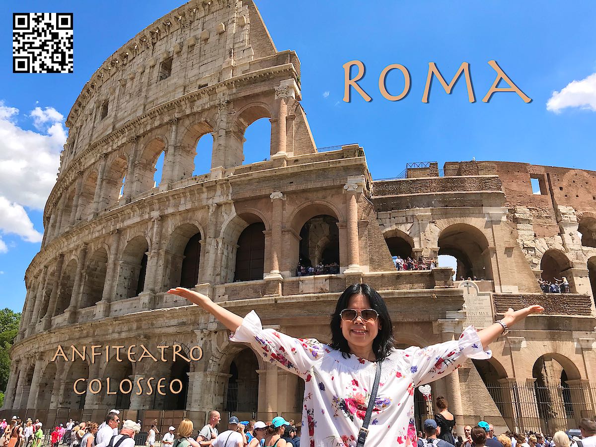 Italy Rome Roma Colosseo Colosseum woman holding up hands.